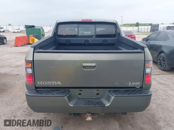 2007 Honda Ridgeline RTL with VIN 2HJYK16517H513832, listed as a IAAI auction lot 42626411 with 209,171 mi miles and . Bid and sale history available at DreamBid. Image 16.