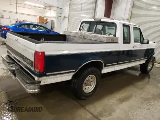 1994 Ford F-150 with VIN 1FTEX15NXRKB34530, listed as a Copart auction lot 84900864 with 133,395 mi miles and Salvage Title. Bid and sale history available at carsss.com. Image 3.