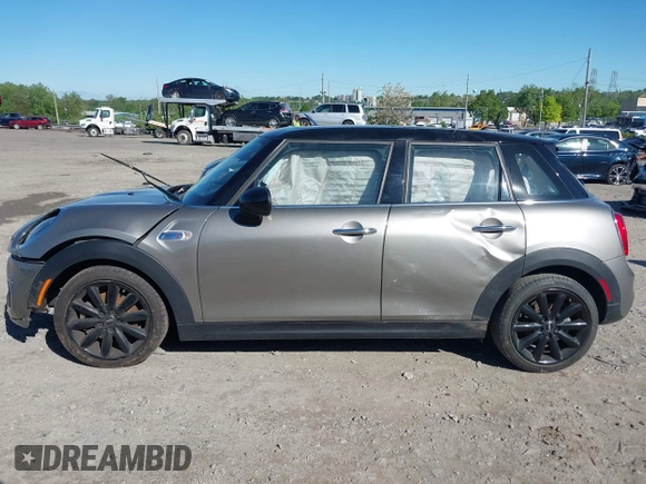 2019 MINI Hardtop 4 Door Cooper S with VIN WMWXU3C52K2H87326, listed as a IAAI auction lot 42204942 with 42,432 mi miles and . Bid and sale history available at DreamBid. Image 13.
