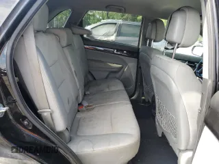 2013 Kia Sorento LX z VIN 5XYKT4A64DG352153, wystawiony jako Copart lot #55330825 z przebiegiem 289 967 mil mil oraz Szkoda całkowita • Salvage title. Historia ofert i sprzedaży dostępna na DreamBid. Obrazek 11.
