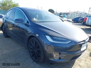 2018 Tesla Model X 75D with VIN 5YJXCBE22JF124270, listed as a IAAI auction lot 41909734 with 92,553 mi miles. Bid and sale history available at carsss.com. Image 1.