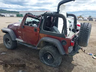 2003 Jeep Wrangler X z VIN 1J4FA39S73P349014, wystawiony jako IAAI lot #42582747 z przebiegiem 50 525 mil mil oraz . Historia ofert i sprzedaży dostępna na DreamBid. Obrazek 3.