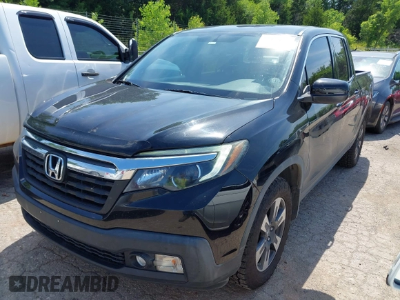 2018 Honda Ridgeline RTL-T with VIN 5FPYK3F67JB013171, listed as a IAAI auction lot 42498827 with 124,415 mi miles and . Bid and sale history available at DreamBid. Image 18.