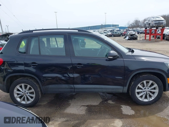 2018 Volkswagen Tiguan with VIN WVGBV7AX3JK002325, listed as a IAAI auction lot 41960059 with 57,619 mi miles and . Bid and sale history available at DreamBid. Image 13.