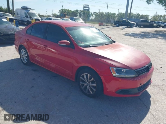 2011 Volkswagen Jetta SE z VIN 3VWDX7AJ1BM056944, wystawiony jako IAAI lot #41782376 z przebiegiem 127 336 mil mil oraz . Historia ofert i sprzedaży dostępna na DreamBid. Obrazek 1.