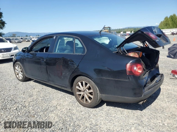 2010 Volkswagen Jetta S with VIN 3VWJZ7AJ1AM032185, listed as a Copart auction lot 58562615 with 189,752 mi miles and Salvage title. Bid and sale history available at DreamBid. Image 2.