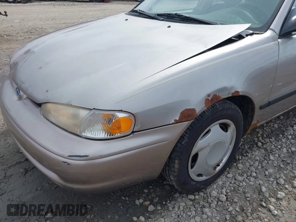 1999 Chevrolet Prizm z VIN 1Y1SK5488XZ446950, wystawiony jako IAAI lot #41798129 z przebiegiem 292 798 mil mil oraz . Historia ofert i sprzedaży dostępna na DreamBid. Obrazek 6.