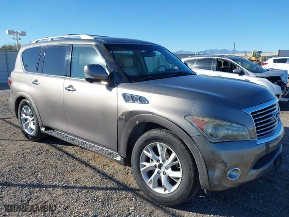 2014 Infiniti QX80 with VIN JN8AZ2ND7E9750777, listed as a IAAI auction lot 41336719 with 121,427 mi miles. Bid and sale history available at carsss.com. Image 1.
