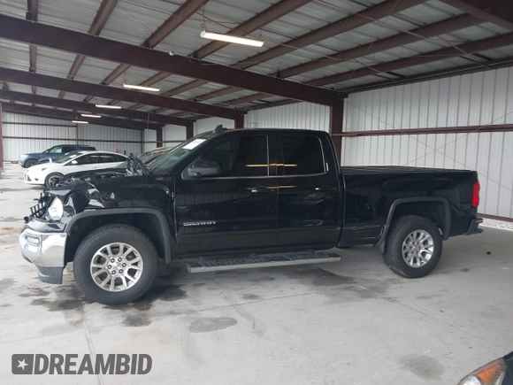 2017 GMC Sierra 1500 SLE z VIN 1GTV2MEC2HZ324763, wystawiony jako IAAI lot #42234082 z przebiegiem 106 984 mil mil oraz . Historia ofert i sprzedaży dostępna na DreamBid. Obrazek 14.
