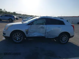 2015 Cadillac SRX Premium Collection with VIN 3GYFNDE32FS530357, listed as a IAAI auction lot 41976585 with 92,335 mi miles and . Bid and sale history available at carsss.com. Image 14.