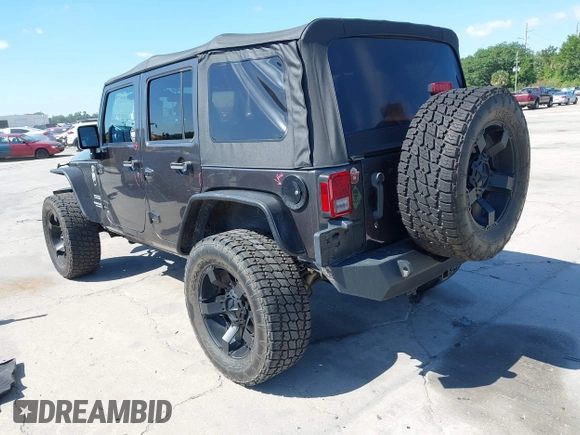 2014 Jeep Wrangler Unlimited Sport with VIN 1C4BJWDG4EL295044, listed as a IAAI auction lot 41997837 with 143,447 mi miles. Bid and sale history available at carsss.com. Image 3.