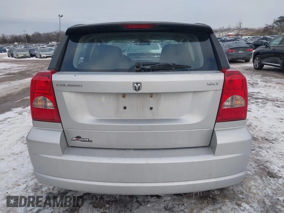 2007 Dodge Caliber SXT with VIN 1B3HB48B07D159549, listed as a IAAI auction lot 41330969 with 124,911 mi miles and . Bid and sale history available at DreamBid. Image 16.