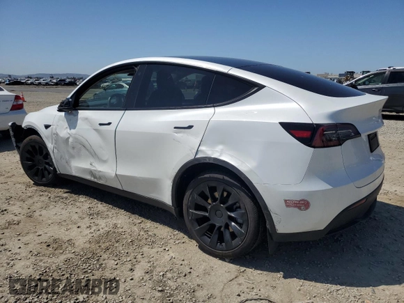 2023 Tesla Model Y Long Range z VIN 7SAYGDEE2PA061792, wystawiony jako Copart lot #52106965 z przebiegiem 11 968 mil mil oraz Szkoda całkowita • Salvage title. Historia ofert i sprzedaży dostępna na DreamBid. Obrazek 2.