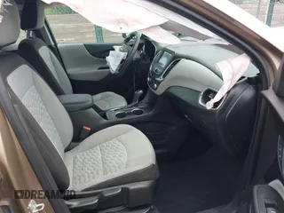 2018 Chevrolet Equinox LS z VIN 3GNAXHEV8JL348269, wystawiony jako IAAI lot #42178337 z przebiegiem 94 675 mil mil oraz . Historia ofert i sprzedaży dostępna na DreamBid. Obrazek 5.