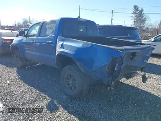 2018 Toyota Tacoma SR with VIN 3TMCZ5AN7JM128860, listed as a IAAI auction lot 41251397 with 97,246 mi miles. Bid and sale history available at carsss.com. Image 3.