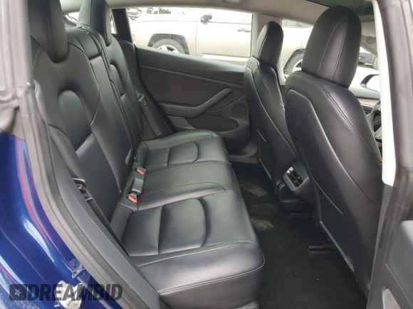 2023 Tesla Model 3 with VIN 5YJ3E1EA7PF450973, listed as a Copart auction lot 61082175 with 47,029 mi miles and Salvage title. Bid and sale history available at DreamBid. Image 11.