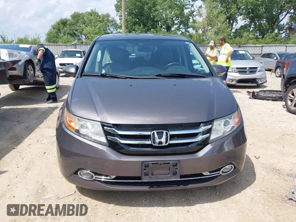 2014 Honda Odyssey Touring with VIN 5FNRL5H99EB138952, listed as a IAAI auction lot 42538833 with 146,959 mi miles and . Bid and sale history available at DreamBid. Image 12.