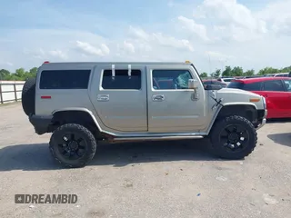2004 Hummer H2 z VIN 5GRGN23U34H105809, wystawiony jako IAAI lot #42456055 z przebiegiem Nie podano mil oraz . Historia ofert i sprzedaży dostępna na DreamBid. Obrazek 13.