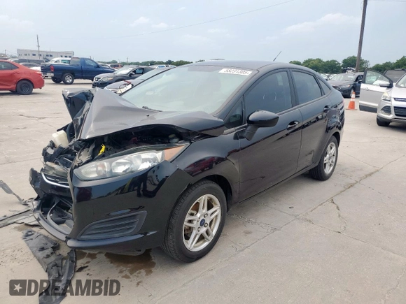 2018 Ford Fiesta SE z VIN 3FADP4BJ8JM134544, wystawiony jako Copart lot #58231305 z przebiegiem Nie podano mil oraz Tytuł czysty. Historia ofert i sprzedaży dostępna na DreamBid. Obrazek 1.