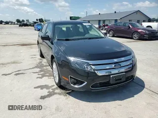 2010 Ford Fusion Hybrid z VIN 3FADP0L36AR176691, wystawiony jako Copart lot #61957685 z przebiegiem 105 452 mil mil oraz Czysty tytuł • Clean title. Historia ofert i sprzedaży dostępna na DreamBid. Obrazek 13.