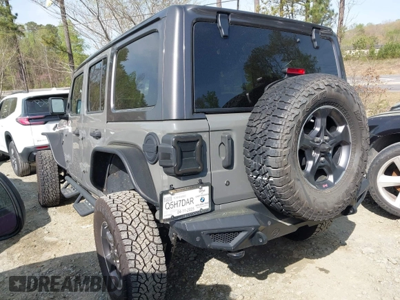 2019 Jeep Wrangler Unlimited Sport Altitude with VIN 1C4HJXDG3KW639148, listed as a IAAI auction lot 41933844 with 57,184 mi miles and . Bid and sale history available at DreamBid. Image 3.