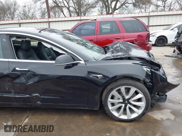 2018 Tesla Model 3 Long Range Battery with VIN 5YJ3E1EB3JF090567, listed as a IAAI auction lot 41568312 with 35,327 mi miles and . Bid and sale history available at DreamBid. Image 20.