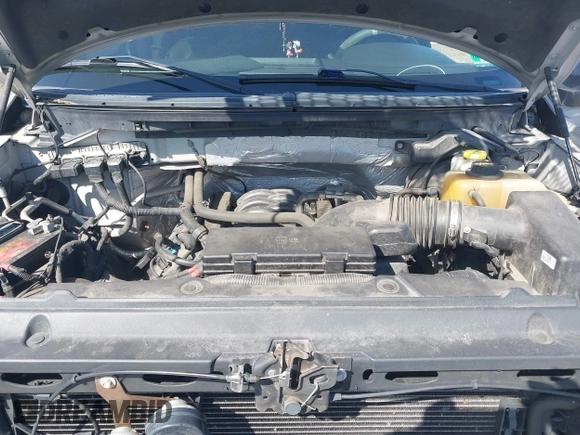 2014 Ford F-150 with VIN 1FTVW1EFXEKD65059, listed as a IAAI auction lot 41791605 with 146,190 mi miles and . Bid and sale history available at DreamBid. Image 10.