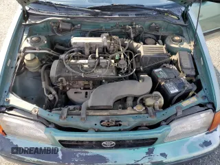 1995 Toyota Tercel DX z VIN JT2EL56E2S7019018, wystawiony jako Copart lot #84929224 z przebiegiem 241 078 mil mil oraz Szkoda całkowita • Salvage title. Historia ofert i sprzedaży dostępna na DreamBid. Obrazek 12.