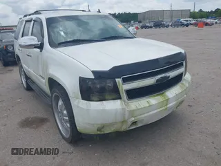2009 Chevrolet Tahoe 2LT z VIN 1GNFC23059R156494, wystawiony jako IAAI lot #42423722 z przebiegiem Nie podano mil oraz . Historia ofert i sprzedaży dostępna na DreamBid. Obrazek 1.