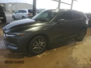 2018 Mazda CX-5 Grand Touring z VIN JM3KFADM2J1302807, wystawiony jako Copart lot #55533485 z przebiegiem 80 573 mil mil oraz Czysty tytuł • Clean title. Historia ofert i sprzedaży dostępna na DreamBid. Obrazek 1.