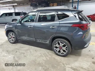 2021 Kia Seltos SX with VIN KNDETCA2XM7167199, listed as a Copart auction lot 52080495 with 82,981 mi miles and Salvage Title. Bid and sale history available at carsss.com. Image 2.