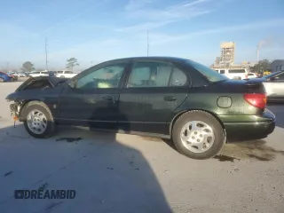 2001 Saturn SL z VIN 1G8ZK52741Z336816, wystawiony jako Copart lot #46798005 z przebiegiem 153 642 mil mil oraz Szkody całkowita. Historia ofert i sprzedaży dostępna na DreamBid. Obrazek 2.