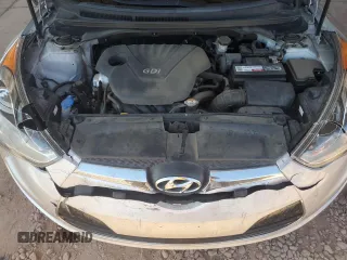 2014 Hyundai Veloster z VIN KMHTC6AD7EU216819, wystawiony jako Copart lot #57135335 z przebiegiem 104 588 mil mil oraz Szkoda całkowita • Salvage title. Historia ofert i sprzedaży dostępna na DreamBid. Obrazek 11.