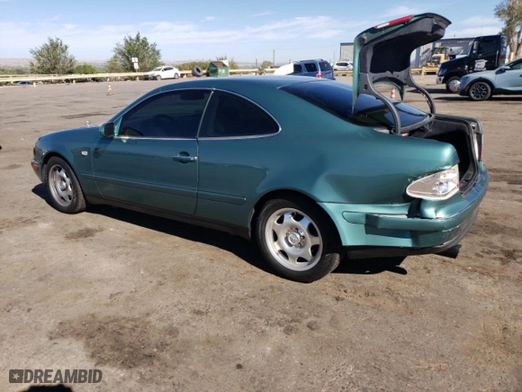 1999 Mercedes-Benz CLK-Class with VIN WDBLJ65G4XF071095, listed as a Copart auction lot 72080064 with 97,558 mi miles and Salvage Title. Bid and sale history available at carsss.com. Image 2.