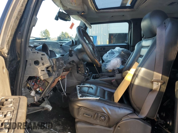 2005 Hummer H2 SUT z VIN 5GRGN22U15H101289, wystawiony jako Copart lot #84107974 z przebiegiem Nie podano mil oraz Szkody całkowita. Historia ofert i sprzedaży dostępna na DreamBid. Obrazek 7.