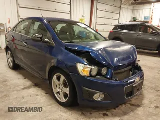 2012 Chevrolet Sonic LTZ z VIN 1G1JE5SB4C4214450, wystawiony jako IAAI lot #42207345 z przebiegiem 120 152 mil mil oraz . Historia ofert i sprzedaży dostępna na DreamBid. Obrazek 1.