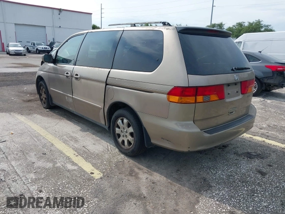 2004 Honda Odyssey EX-L z VIN 5FNRL18954B014748, wystawiony jako IAAI lot #42389048 z przebiegiem 136 176 mil mil oraz . Historia ofert i sprzedaży dostępna na DreamBid. Obrazek 3.
