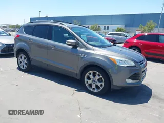 2013 Ford Escape SEL with VIN 1FMCU0HX0DUC16069, listed as a IAAI auction lot 42638924 with 80,200 mi miles and . Bid and sale history available at DreamBid. Image 1.