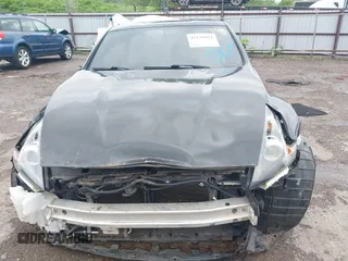 2020 Nissan 370Z Sport z VIN JN1AZ4EH6LM823399, wystawiony jako IAAI lot #42135621 z przebiegiem 98 855 mil mil oraz . Historia ofert i sprzedaży dostępna na DreamBid. Obrazek 13.