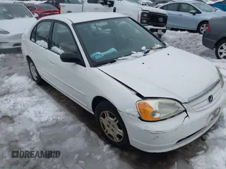 2002 Honda Civic LX with VIN 2HGES16592H517516, listed as a IAAI auction lot 41516218 with 146,957 mi miles and . Bid and sale history available at carsss.com. Image 1.