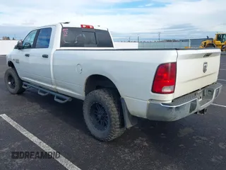 2013 Ram 2500 SLT with VIN 3C6TR5JT5DG517635, listed as a IAAI auction lot 40950960 with 99,372 mi miles and . Bid and sale history available at DreamBid. Image 3.