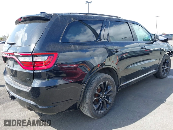 2020 Dodge Durango R/T with VIN 1C4SDJCT5LC330499, listed as a IAAI auction lot 41948714 with 76,254 mi miles and . Bid and sale history available at DreamBid. Image 4.