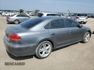 2014 Volkswagen Passat SE z VIN 1VWBN7A30EC078471, wystawiony jako Copart lot #60243135 z przebiegiem 96 862 mil mil oraz Szkoda całkowita • Salvage title. Historia ofert i sprzedaży dostępna na DreamBid. Obrazek 3.