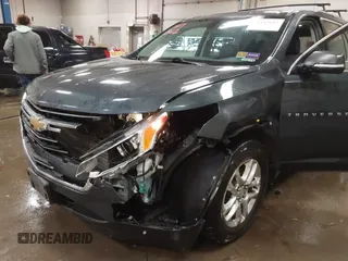 2020 Chevrolet Traverse LT with VIN 1GNEVHKW5LJ203804, listed as a IAAI auction lot 41143612 with 93,947 mi miles and . Bid and sale history available at DreamBid. Image 6.