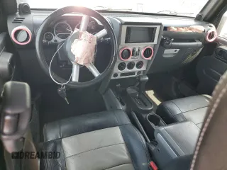 2008 Jeep Wrangler Unlimited Sahara with VIN 1J4GA59178L607960, listed as a Copart auction lot 57855995 with 122,913 mi miles and Salvage title. Bid and sale history available at DreamBid. Image 8.