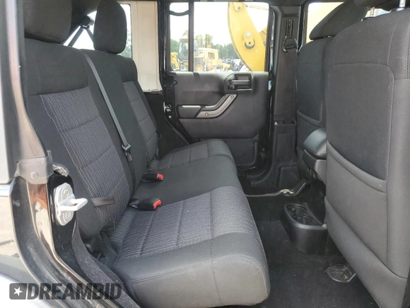 2012 Jeep Wrangler Unlimited Sport z VIN 1C4BJWDG4CL243538, wystawiony jako Copart lot #58826675 z przebiegiem 126 646 mil mil oraz Szkoda całkowita • Salvage title. Historia ofert i sprzedaży dostępna na DreamBid. Obrazek 10.