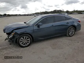 2021 Toyota Avalon Hybrid XLE z VIN 4T1AA1AB3MU003556, wystawiony jako Copart lot #46058415 z przebiegiem 31 325 mil mil oraz Nie do naprawy • Non repairable. Historia ofert i sprzedaży dostępna na DreamBid. Obrazek 1.
