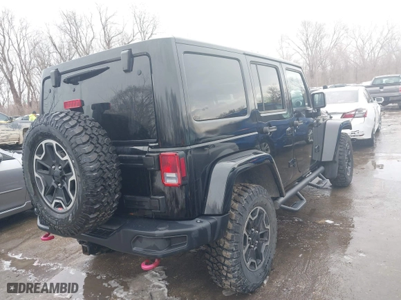 2015 Jeep Wrangler Unlimited Rubicon Hard Rock with VIN 1C4HJWFG9FL569962, listed as a IAAI auction lot 41557801 with 78,597 mi miles. Bid and sale history available at carsss.com. Image 4.