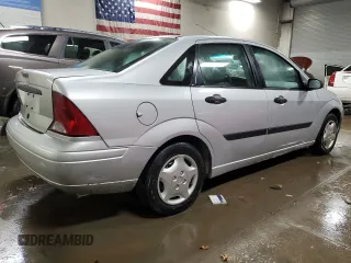 2003 Ford Focus LX z VIN 1FAFP33P03W313279, wystawiony jako Copart lot #89271495 z przebiegiem 152 672 mil mil oraz Szkoda całkowita • Salvage title. Historia ofert i sprzedaży dostępna na DreamBid. Obrazek 3.