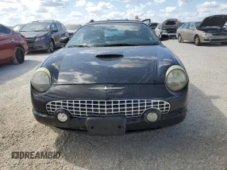 2002 Ford Thunderbird Hardtop Premium with VIN 1FAHP60A12Y120989, listed as a Copart auction lot 77573084 with Not Provided miles and Salvage Title. Bid and sale history available at DreamBid. Image 5.